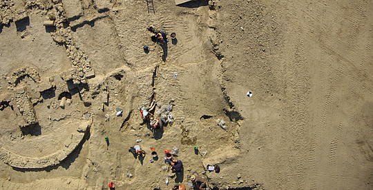 Aerial shot done with a Microdrones UAV, Archaeologists during the excavation of a historical site